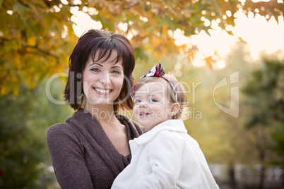 Attractive Mother and Daughter Portrait Outside