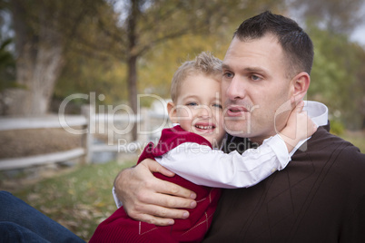 Handsome Father and Son in the Park