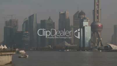 Shanghai Pudong Grand Skyline As Boats Sail Past