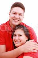 Portrait of a happy young couple having fun together against whi