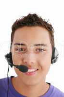 Smiling young man with telephone headset isolated on white backg