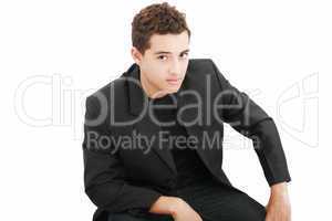 Young casual boy posing isolated on white