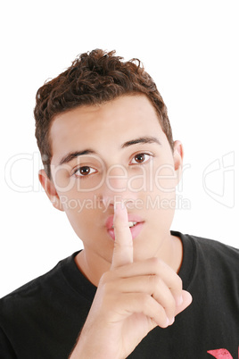 young man with finger on his mouth isolated over white backgroun