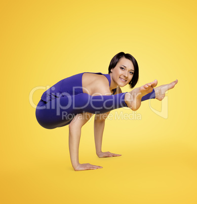 woman exercise yoga arm balance and smile
