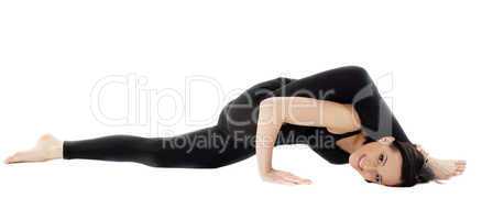 Young woman doing bends yoga asana