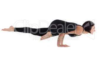 young woman stand arm balance yoga