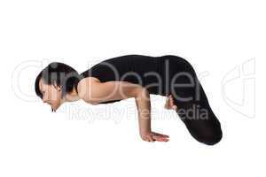 woman doing arm balance yoga side view