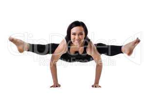 woman arm balance yoga - doing split isolated