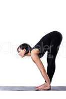 woman stand in yoga pose - black training costume