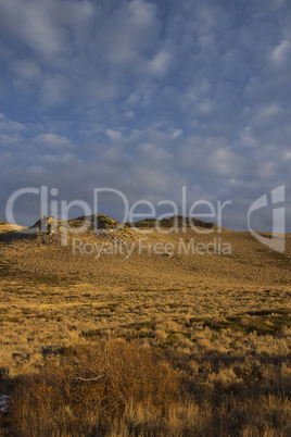 High desert sunset mountain with clouds