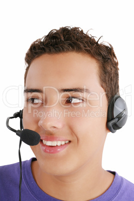 Smiling businessman talking on headset against a white backgroun