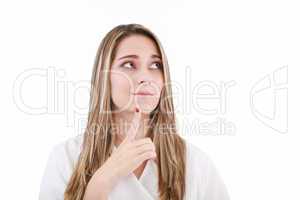 Thinking woman looking up, isolated on white