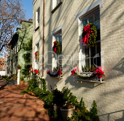 Cream colored house with xmas wreath