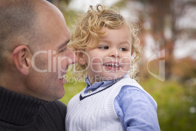 Handsome Father and Son in the Park