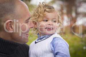 Handsome Father and Son in the Park