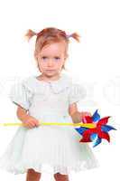Young girl happy with wind toy on the white
