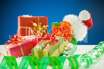 Christmas presents against blue background