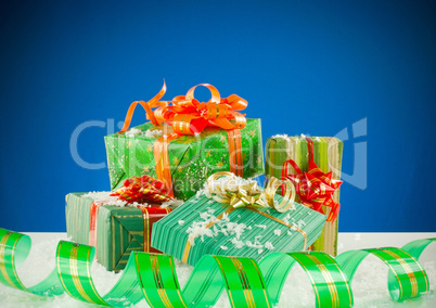 Christmas presents against blue background