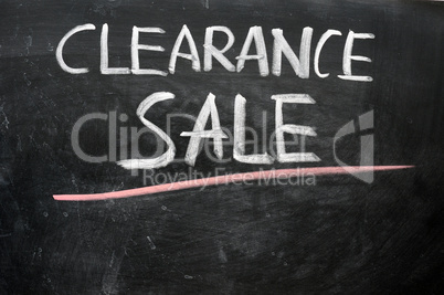 Clearance sale written on a blackboard