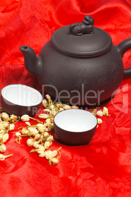 jasmine tea over red silk