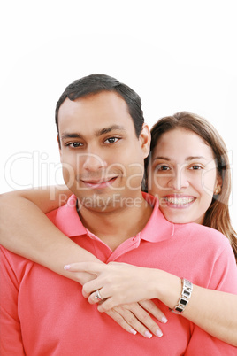 Young love couple smiling. Over white background