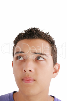 Young man looking up into open space. Isolated over white backgr