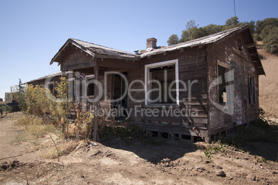 Old barn house with a blue clear sky