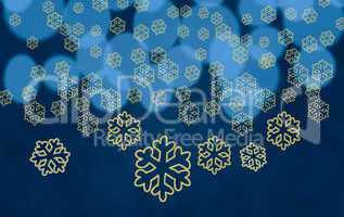 Snowflake shapes against tree lights