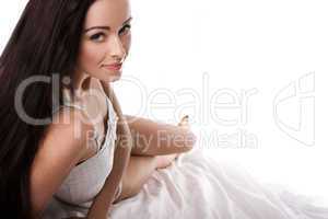 Serene Beauty Reclining On Bed