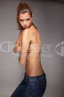 Young Woman In Jeans Implied Topless