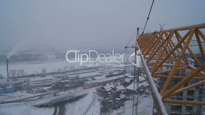 Winter construction. With the boom of a crane. Ufa, Russia, building site