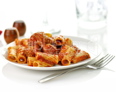 Rigatoni with tomato sauce and meatballs.