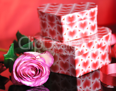 pink rose and gift boxes