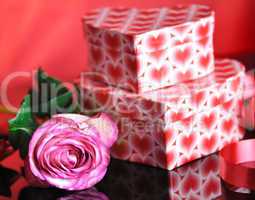 pink rose and gift boxes