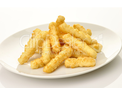 fried potatoes in a white plate