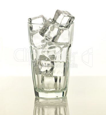 empty glass with ice cubes