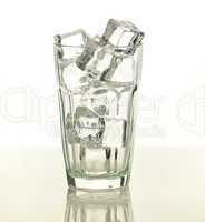 empty glass with ice cubes