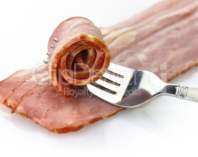 turkey bacon with fork