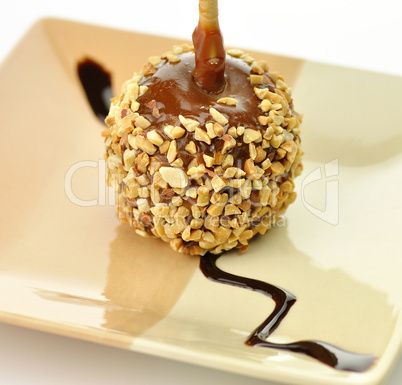 Candy apple with caramel sauce