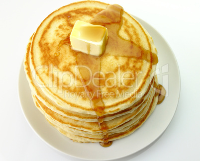 pancakes with butter and maple syrup.