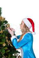 Young christmas girl decorate new year fir tree