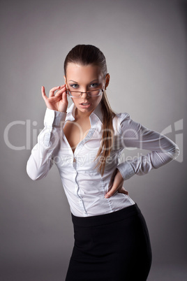 Sexy business woman take glasses off