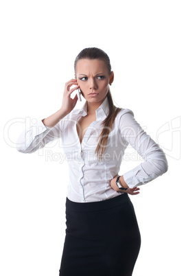 Sexy young serious business woman talk on phone