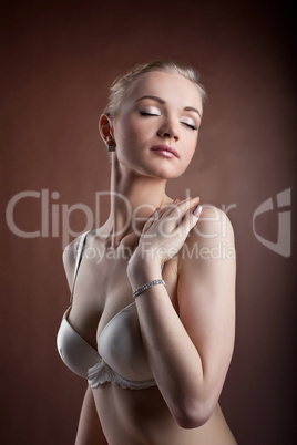 Beautiful woman portrait in white bra