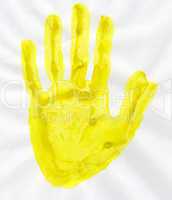Yellow stamp handprint