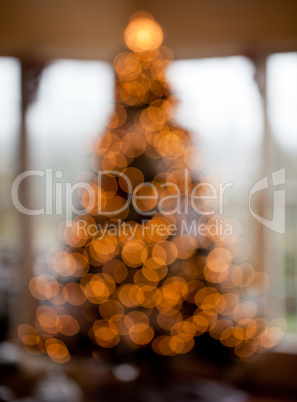 Blurred christmas tree in home