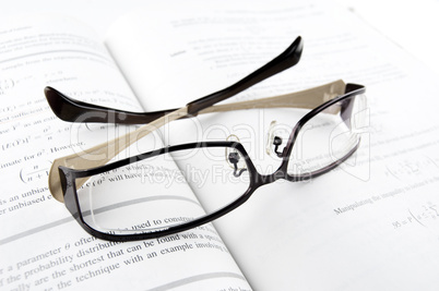 Glasses on Mathematics Book