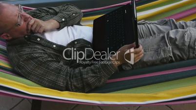 Male - with Notebook on Hammock