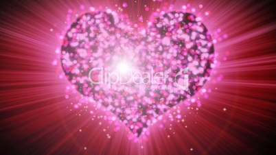 shining heart shape of pink particles loopable