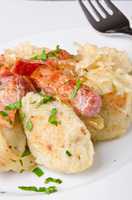 silesian potato dumplings with smoked pork and sauerkraut